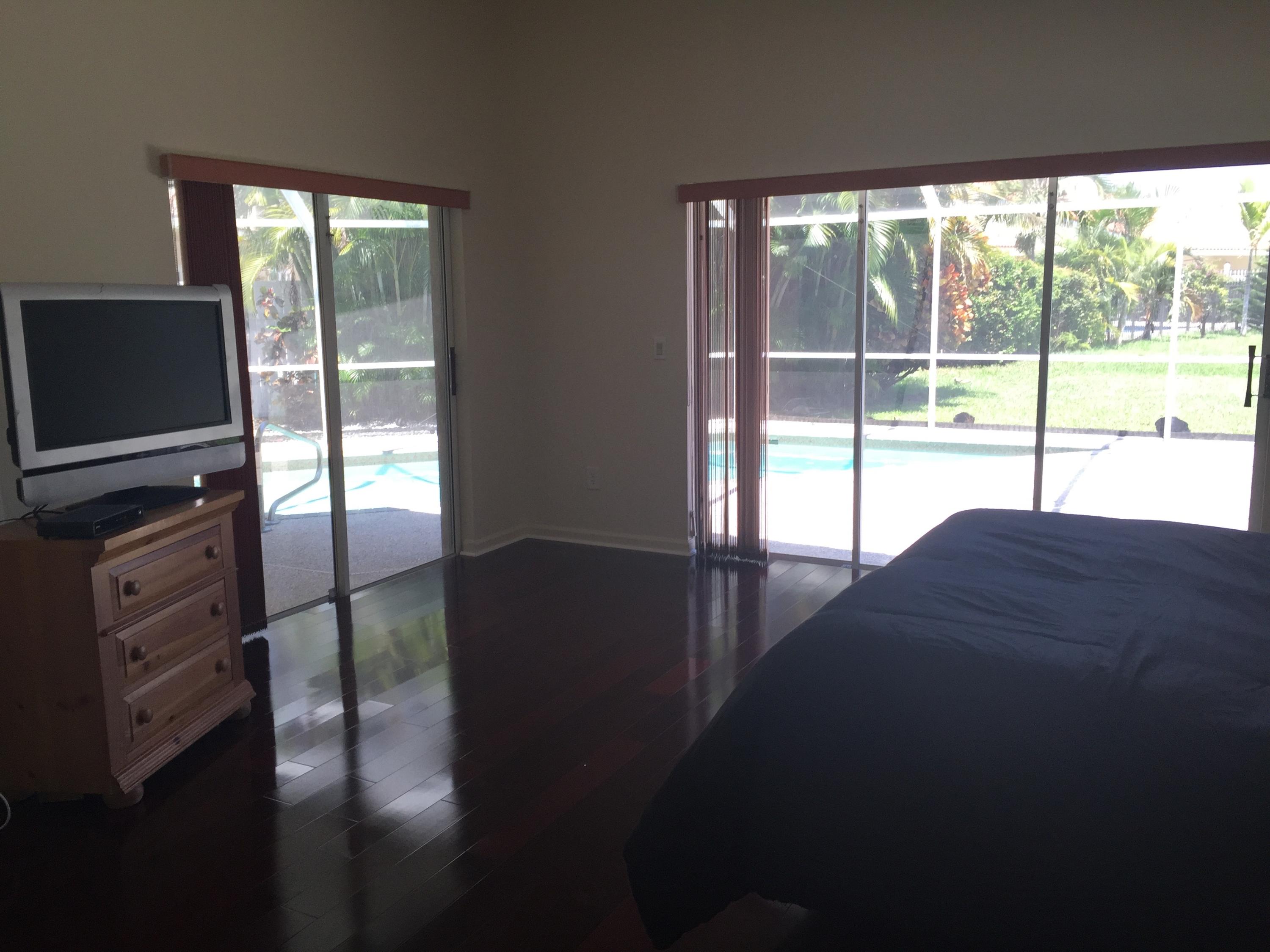285 Northwest 69th Street Boca Raton, FL 33487 - Photo 8 of 30 Master Bedroom, mahogany floors