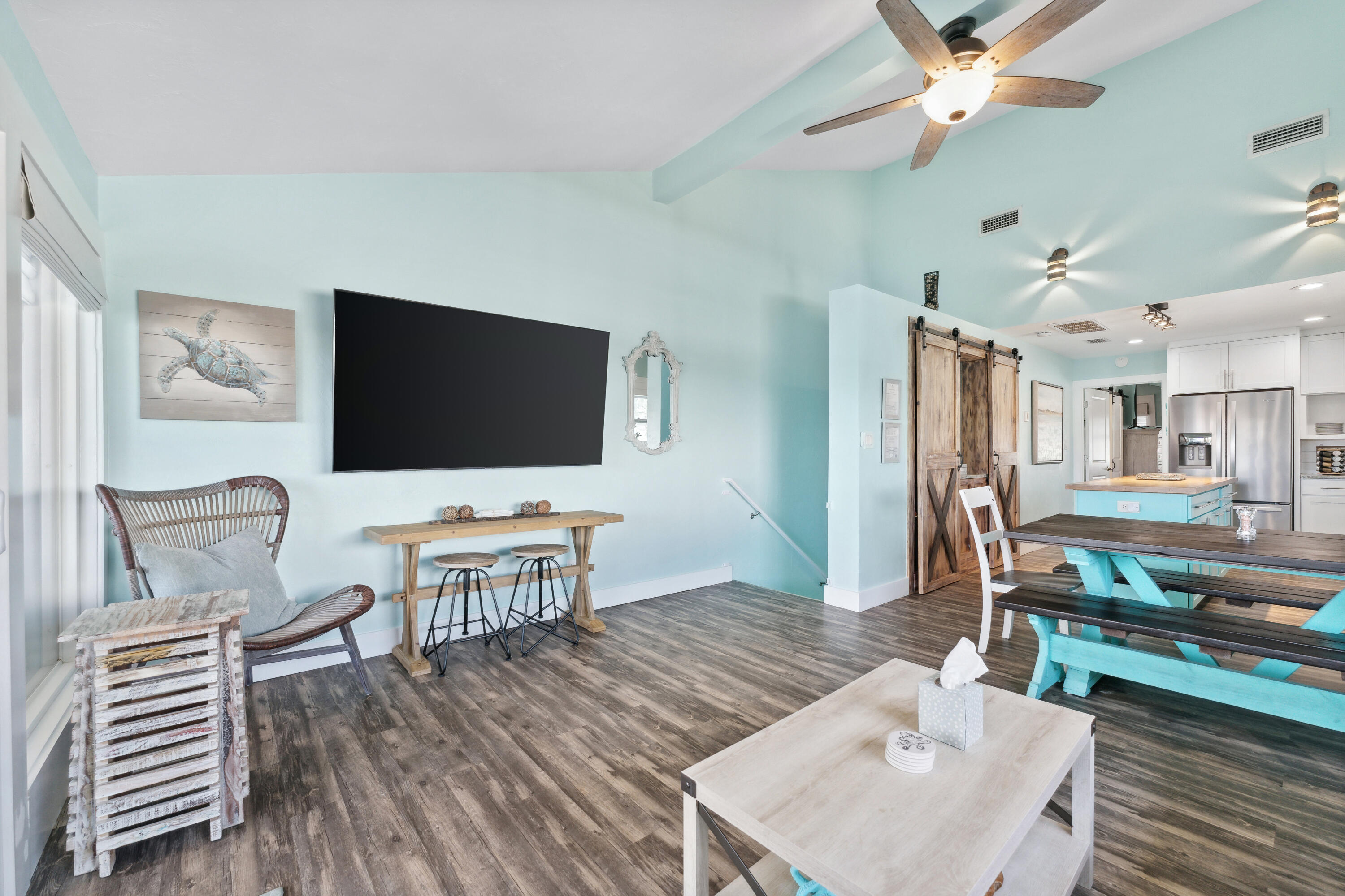129 Durango Road, Unit 1 Destin, FL 32541 - Photo 44 of 71 a living room with furniture and a flat screen tv