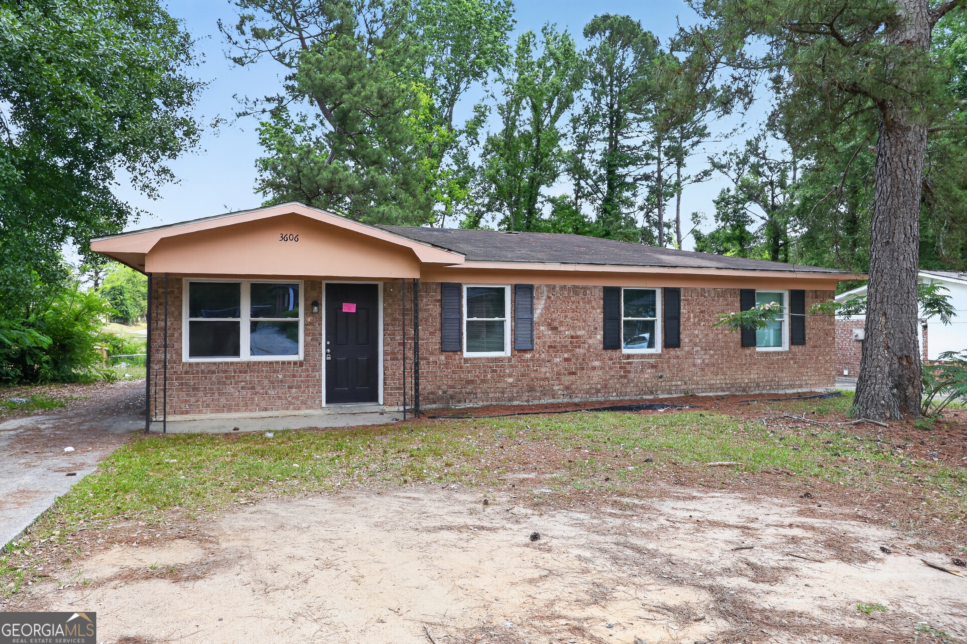 3606 Alene Circle Augusta, GA 30906 - Photo 1 of 30 a front view of a house with a garden and yard