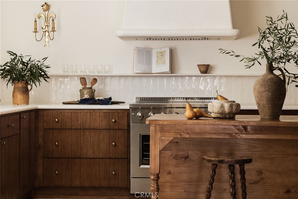 a room with a sink and cabinets