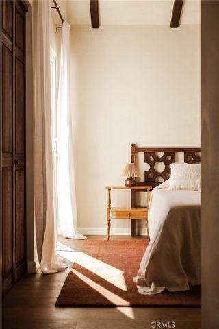 a view of a chairs and table in patio