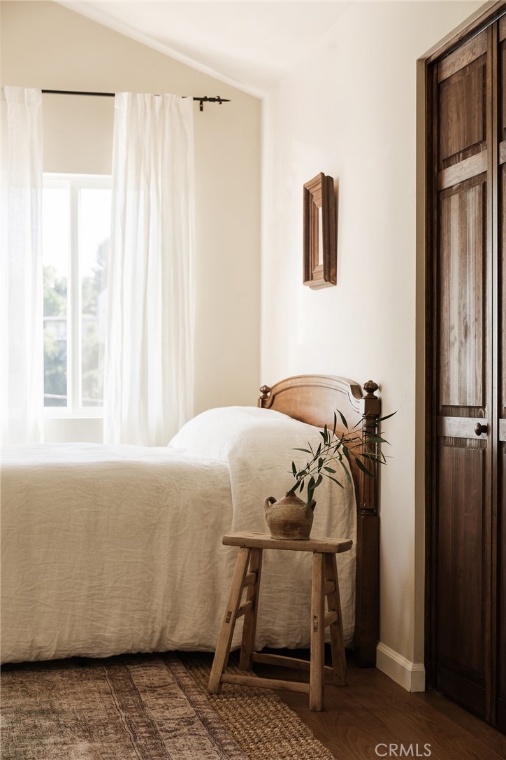 718 Sunnyhill Drive Los Angeles, CA 90065 - Photo 20 of 28 a bedroom with a bed and a window