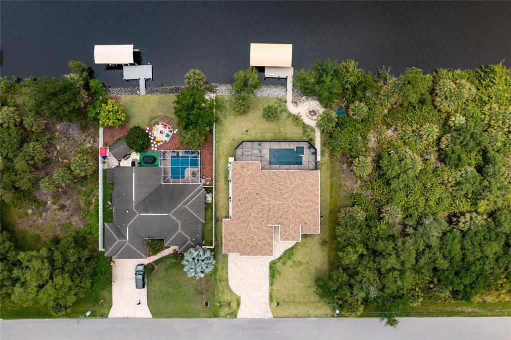 14056 Hydrangea Avenue Port Charlotte, FL 33953 - Photo 11 of 73 an aerial view of a house with outdoor space