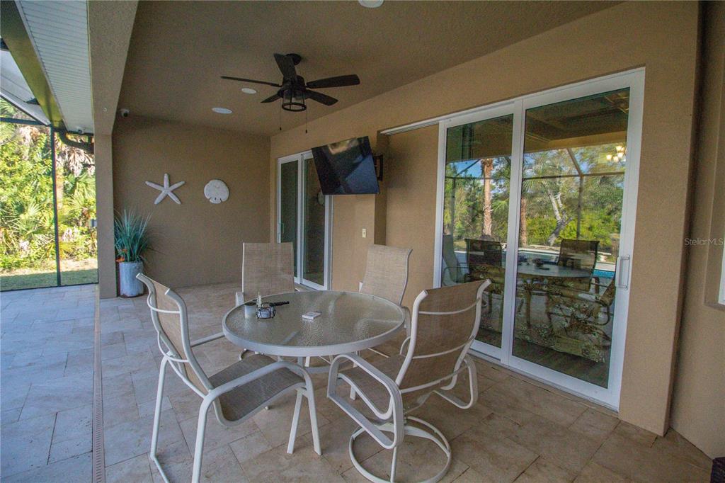 14056 Hydrangea Avenue Port Charlotte, FL 33953 - Photo 41 of 73 a dining room with furniture and window
