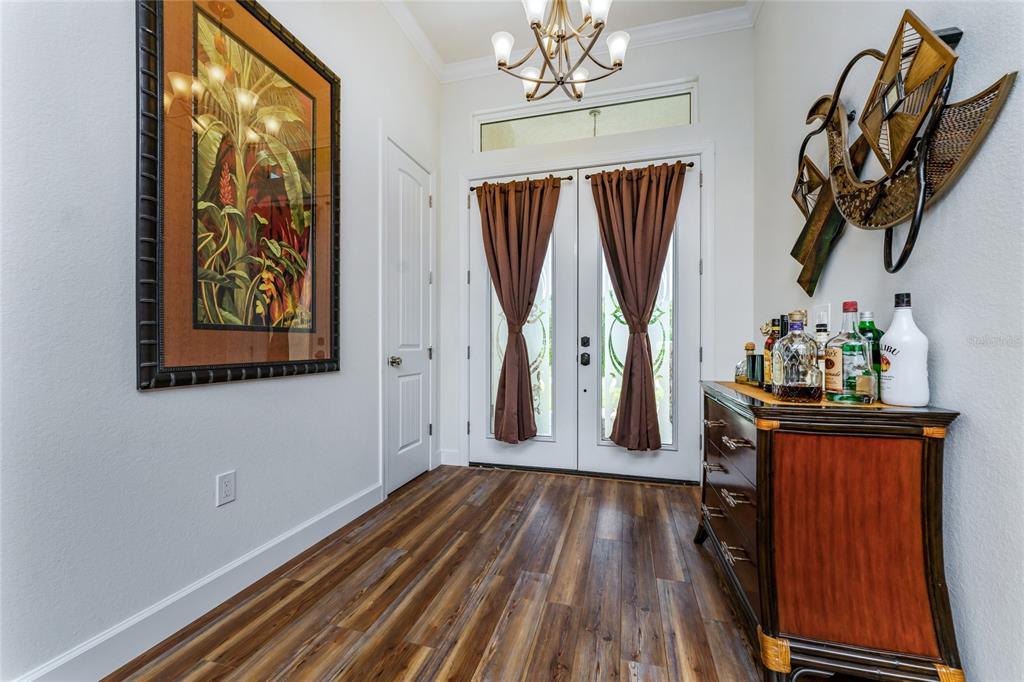 14056 Hydrangea Avenue Port Charlotte, FL 33953 - Photo 48 of 73 a view of a room with wooden floor and stairs