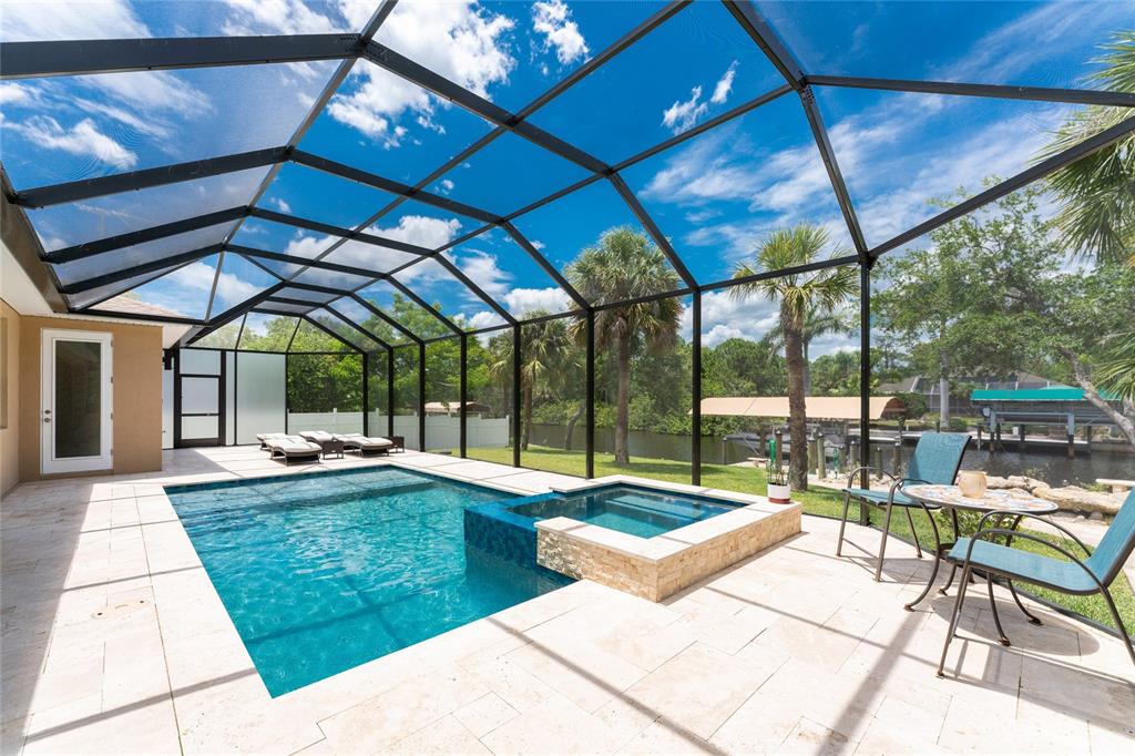 14056 Hydrangea Avenue Port Charlotte, FL 33953 - Photo 52 of 73 a view of swimming pool with a patio