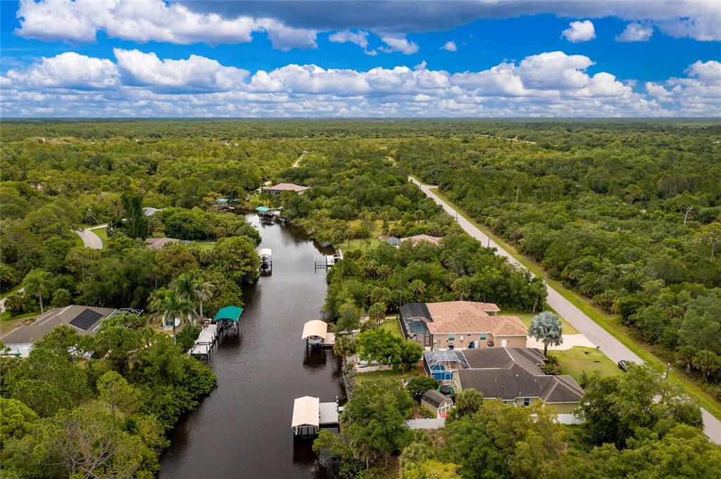14056 Hydrangea Avenue Port Charlotte, FL 33953 - Photo 70 of 73 an aerial view of residential houses with outdoor space