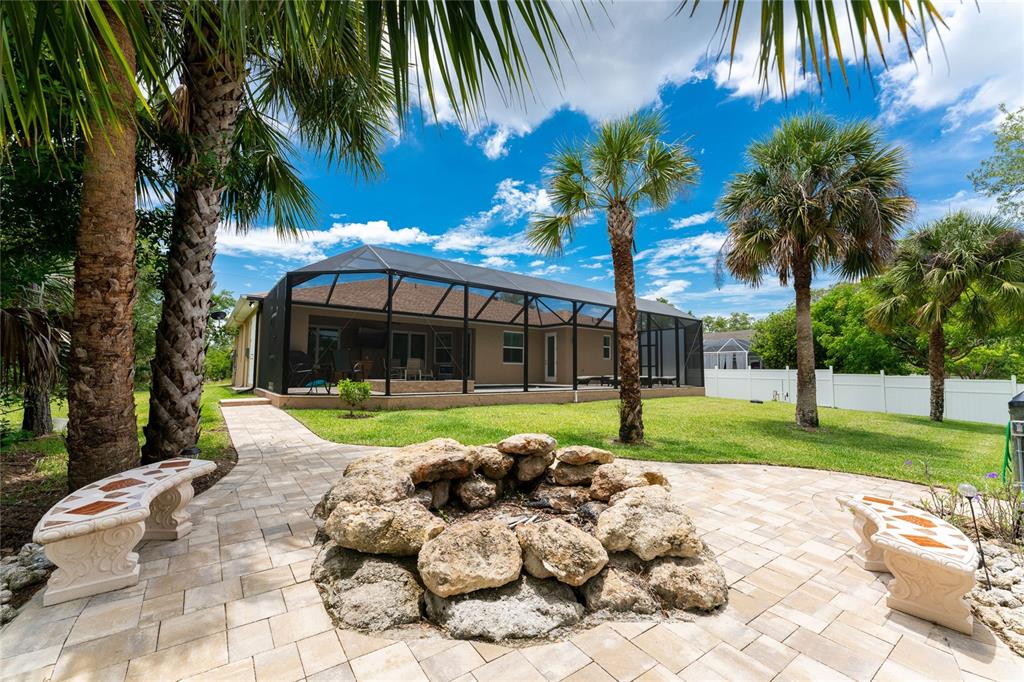 14056 Hydrangea Avenue Port Charlotte, FL 33953 - Photo 10 of 73 a view of a house with a yard and garden