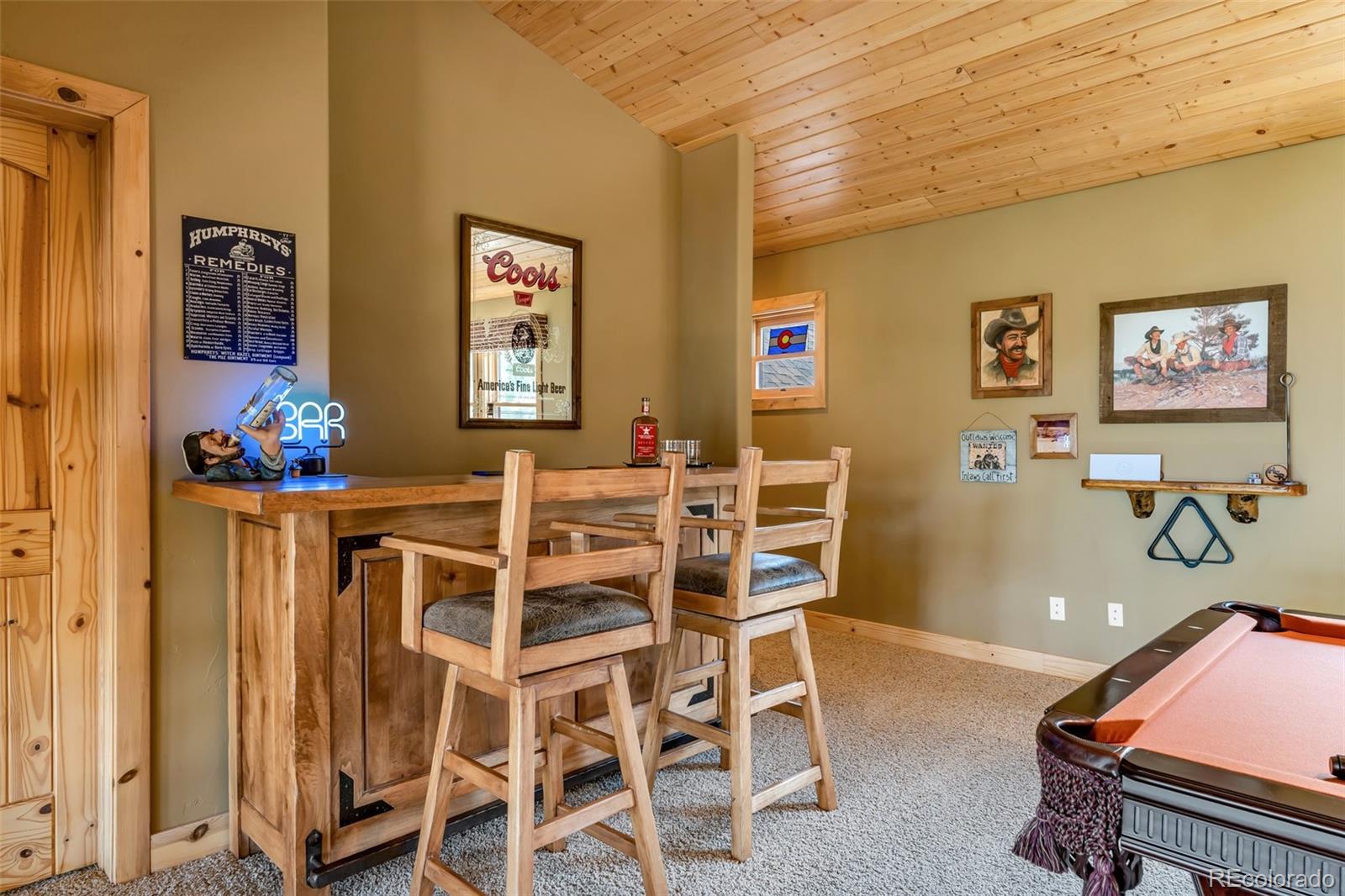 400 Ridge Road Westcliffe, CO 81252 - Photo 18 of 37 a view of a dining room with furniture and wooden floor