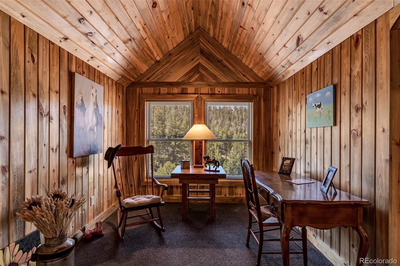 400 Ridge Road Westcliffe, CO 81252 - Photo 28 of 37 a dining room with furniture and wooden floor