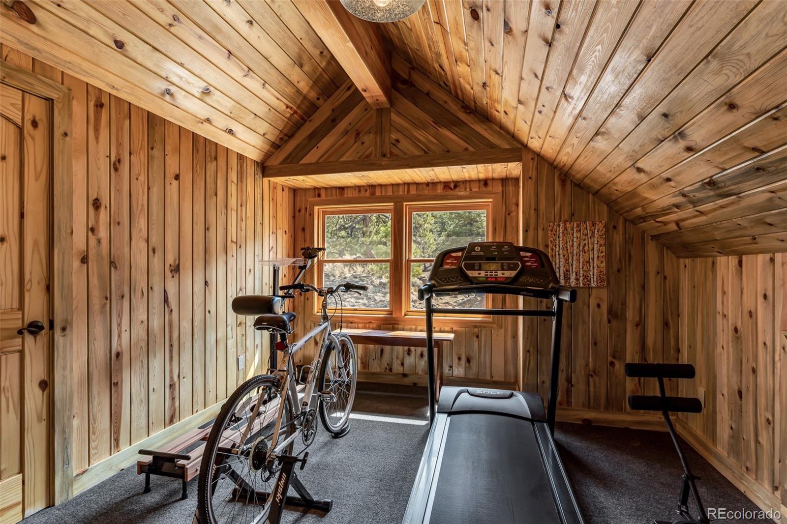 400 Ridge Road Westcliffe, CO 81252 - Photo 29 of 37 a view of a room with gym equipment
