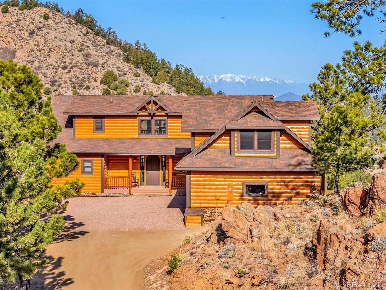 400 Ridge Road Westcliffe, CO 81252 - Photo 35 of 37 a front view of a house with a yard