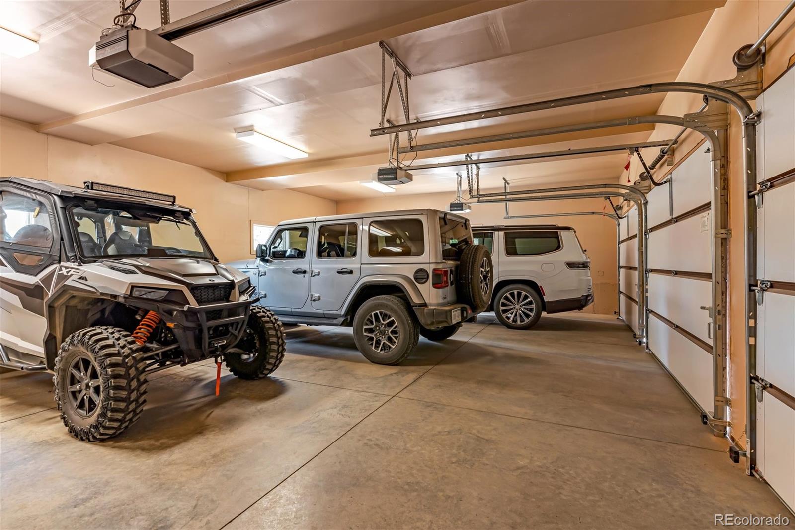 400 Ridge Road Westcliffe, CO 81252 - Photo 36 of 37 a view of a garage with cars