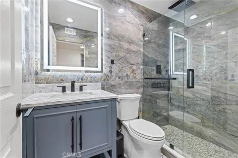 an empty room with wooden floor