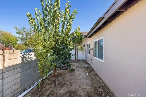 an aerial view of a house with a mountain view