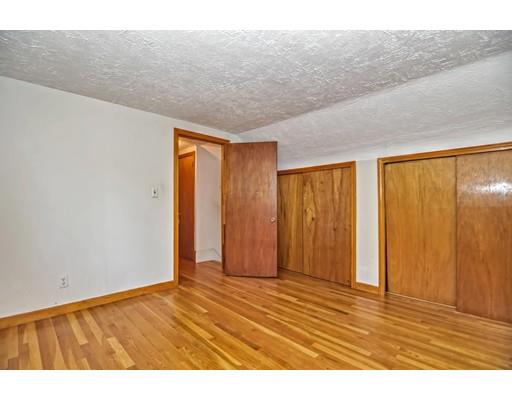58 Ravine Road Medford, MA 02155 - Photo 12 of 13 a view of an empty room and wooden floor