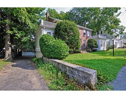 58 Ravine Road Medford, MA 02155 - Photo 2 of 13 a front view of a house with a yard