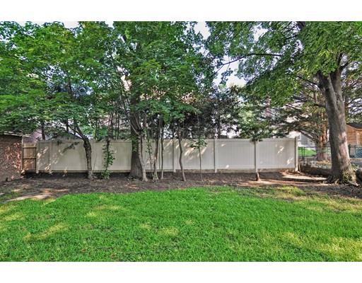 58 Ravine Road Medford, MA 02155 - Photo 3 of 13 a backyard of a house with lots of green space