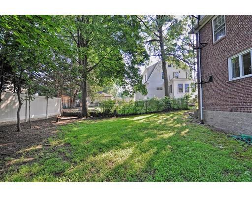 58 Ravine Road Medford, MA 02155 - Photo 4 of 13 a view of house with backyard
