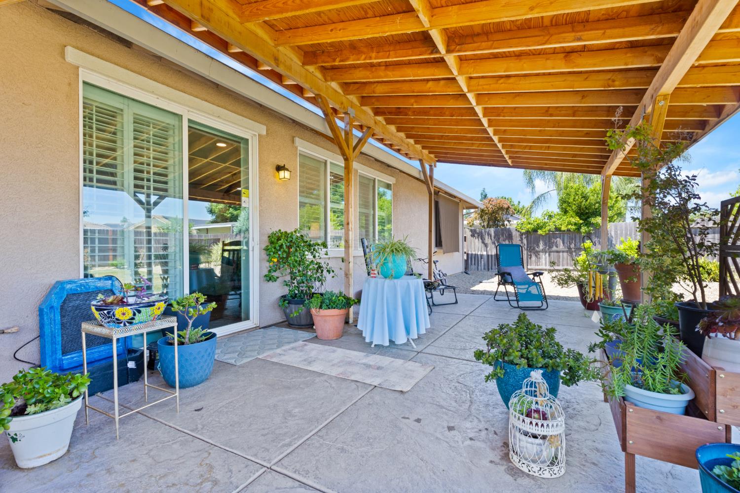2011 Roy Ranch Way Plumas Lake, CA 95961 - Photo 24 of 49 a view of a patio with plants and furniture