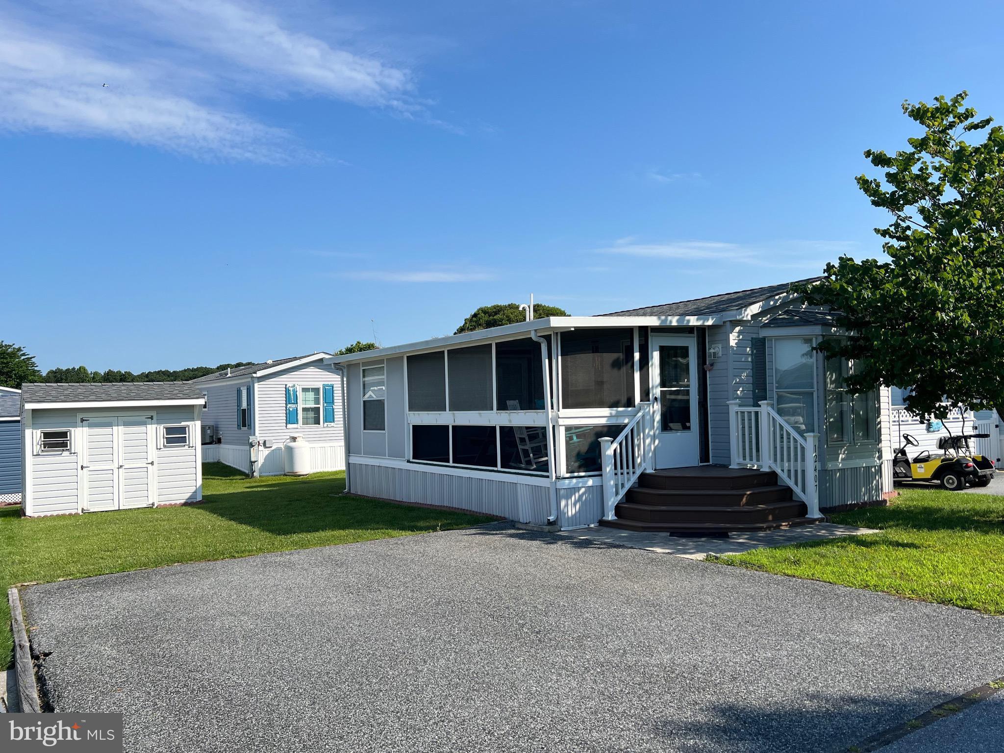 a view of a house with a garden