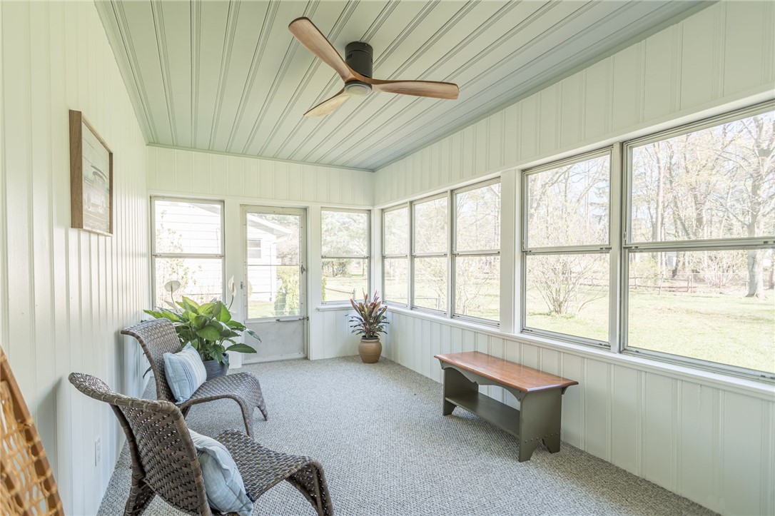 235 Longview Drive Webster, NY 14580 - Photo 16 of 21 Sunroom overlooks yard