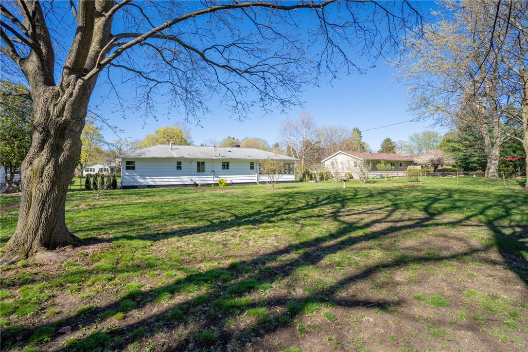 235 Longview Drive Webster, NY 14580 - Photo 18 of 21 Completely fenced in backyard