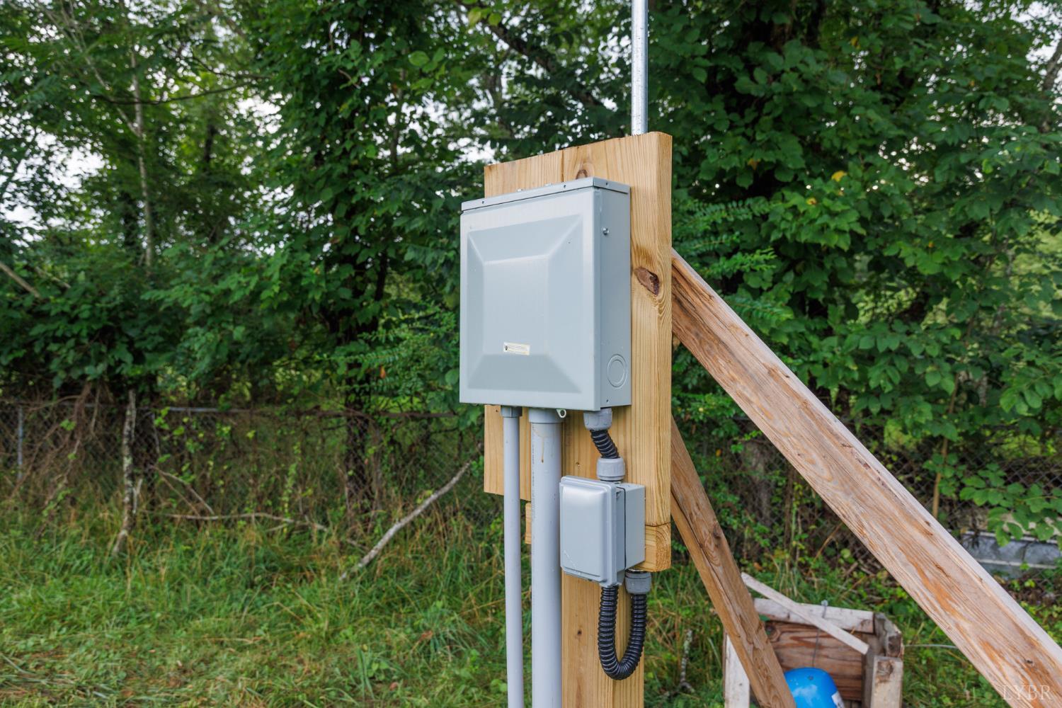 0 41 News Road Eagle Rock, VA 24085 - Photo 45 of 51 a view of a yard with plants and a table under an umbrella