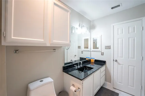 a bathroom with a sink and a toilet