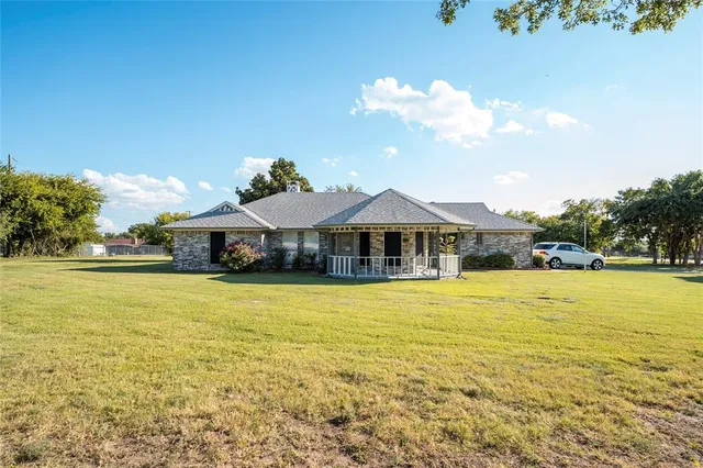a view of a swimming pool and an outdoor space