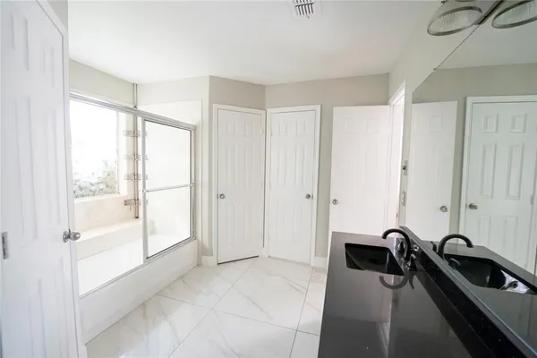 a view of a room with a large window