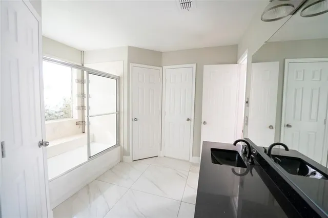 a view of a room with a large window