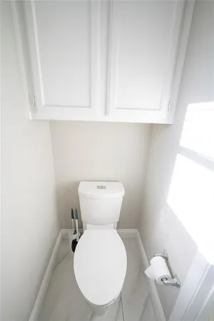 a bathroom with a toilet