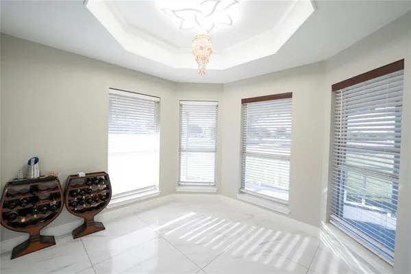 a bedroom with furniture and a large bed