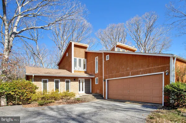 front view of a house with a street