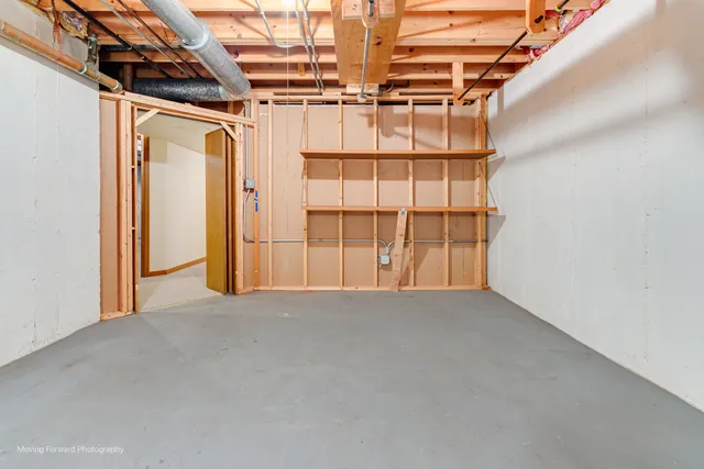 a view of an empty room with a garage
