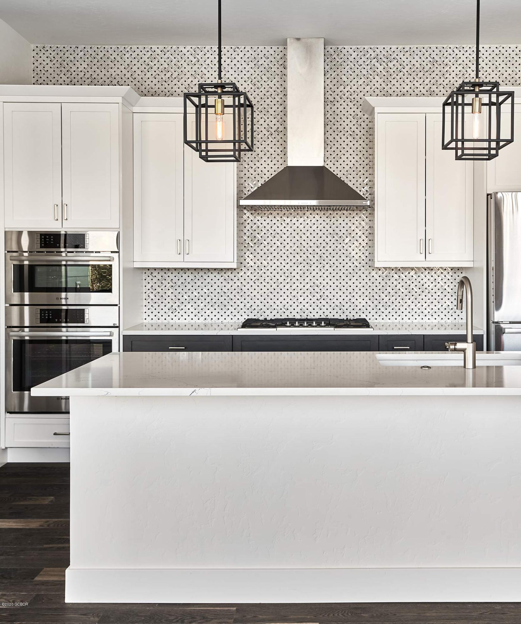 108 Rendezvous Way Winter Park, CO 80482 - Photo 14 of 16 a view of a kitchen with a sink and dishwasher