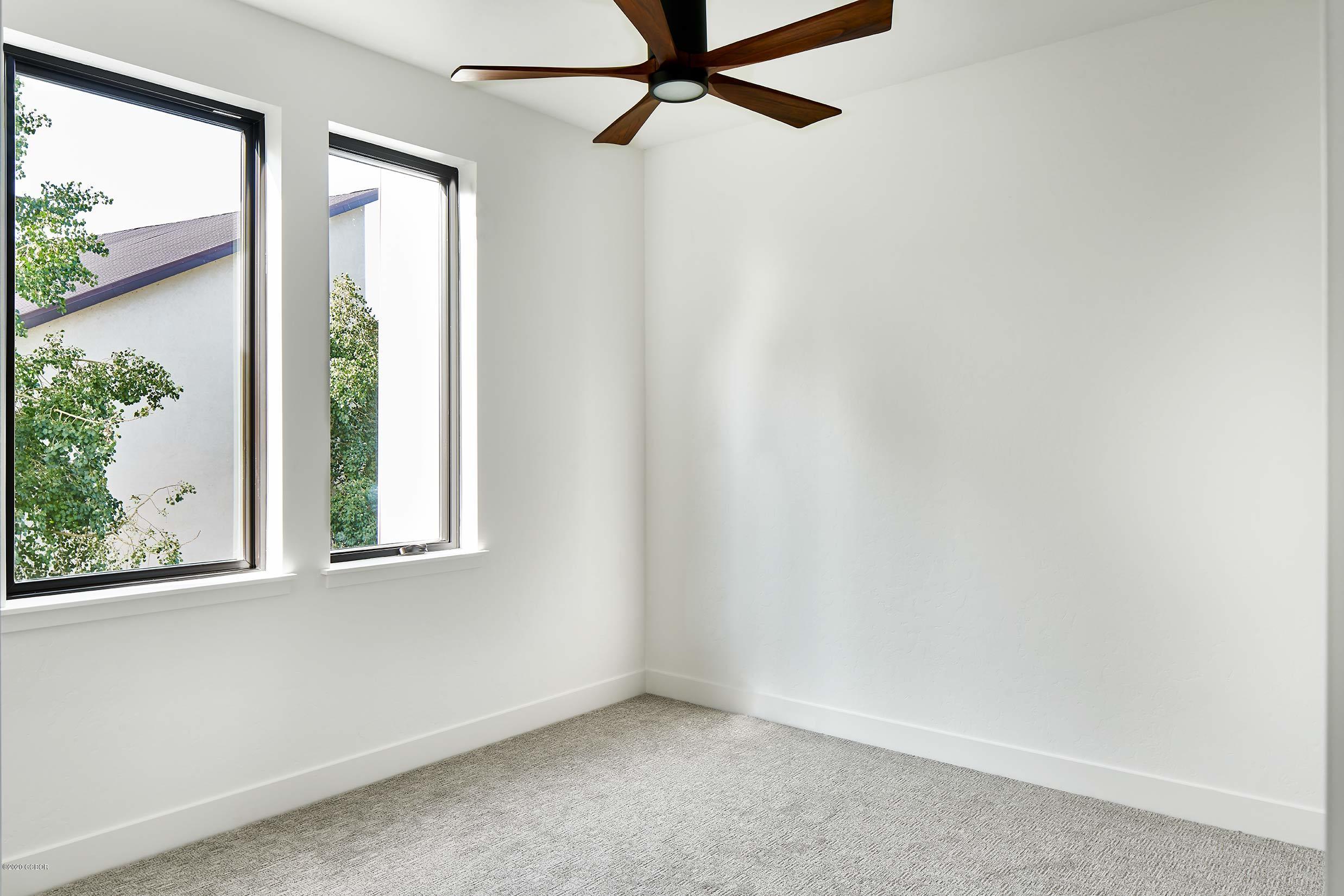 108 Rendezvous Way Winter Park, CO 80482 - Photo 6 of 16 an empty room with a window