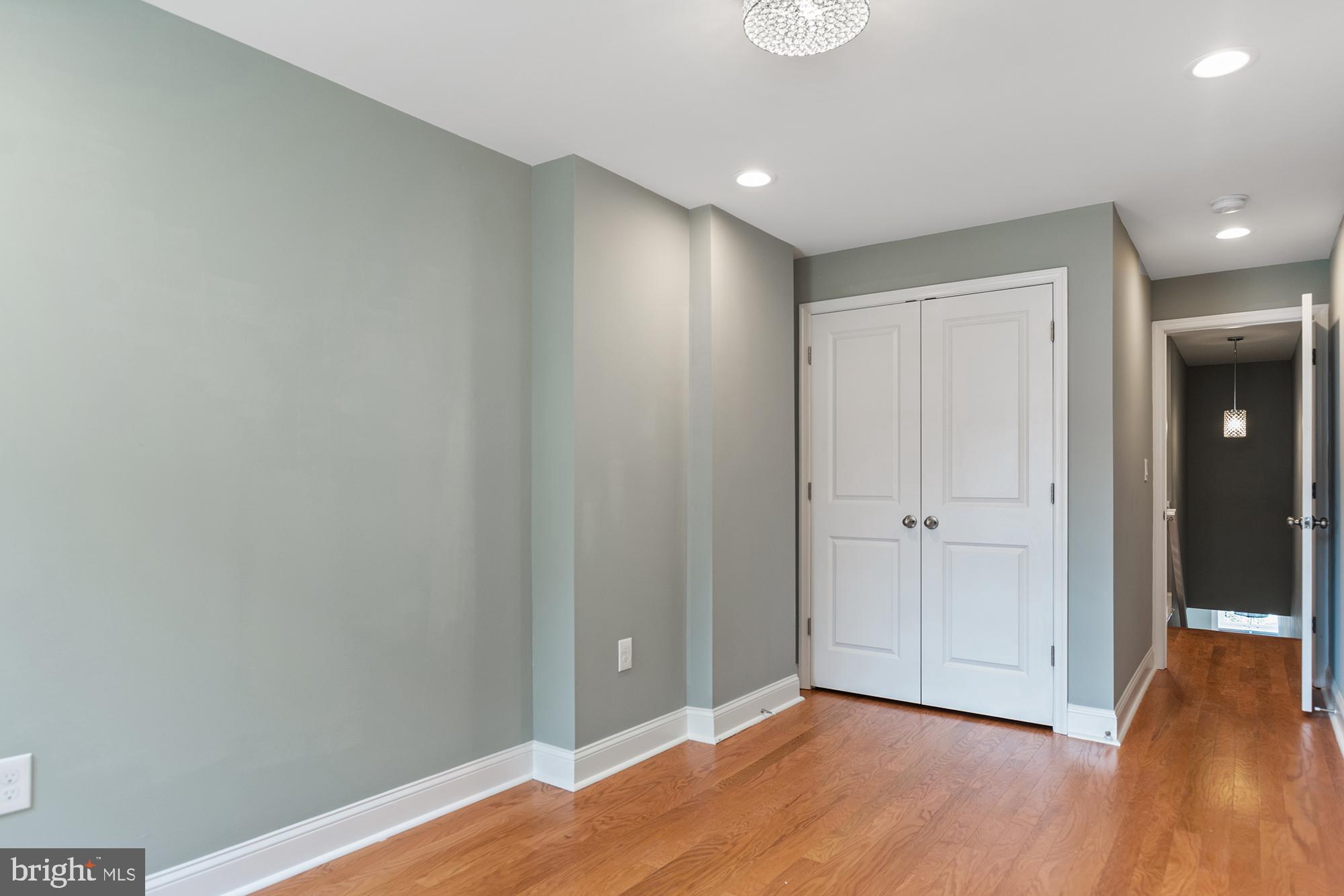 1433 Federal Street Baltimore, MD 21213 - Photo 5 of 9 a view of hallway with wooden floor