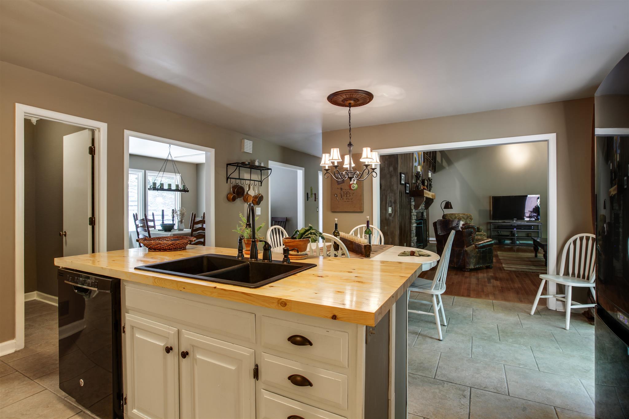 823 High Point Ridge Road Franklin, TN 37069 - Photo 16 of 30 a view of a dining table chairs and chandelier