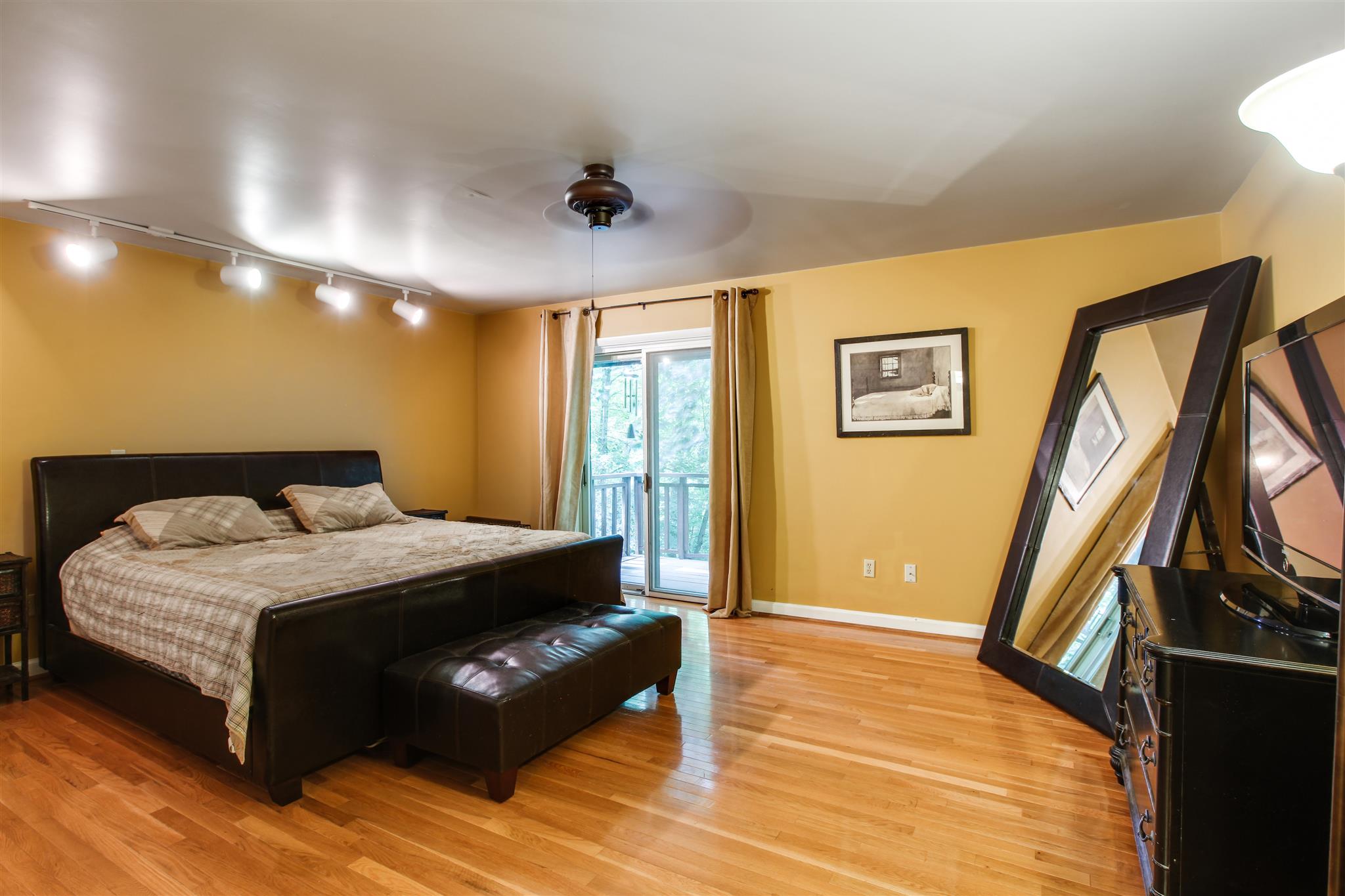 823 High Point Ridge Road Franklin, TN 37069 - Photo 17 of 30 a bed sitting in a spacious bedroom next to a window