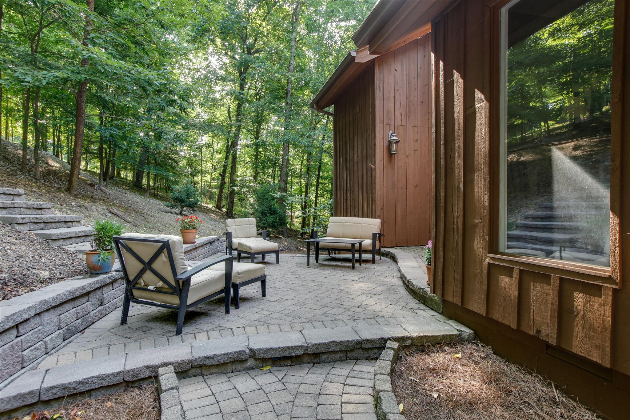 823 High Point Ridge Road Franklin, TN 37069 - Photo 3 of 30 a view of a outdoor space with seating area