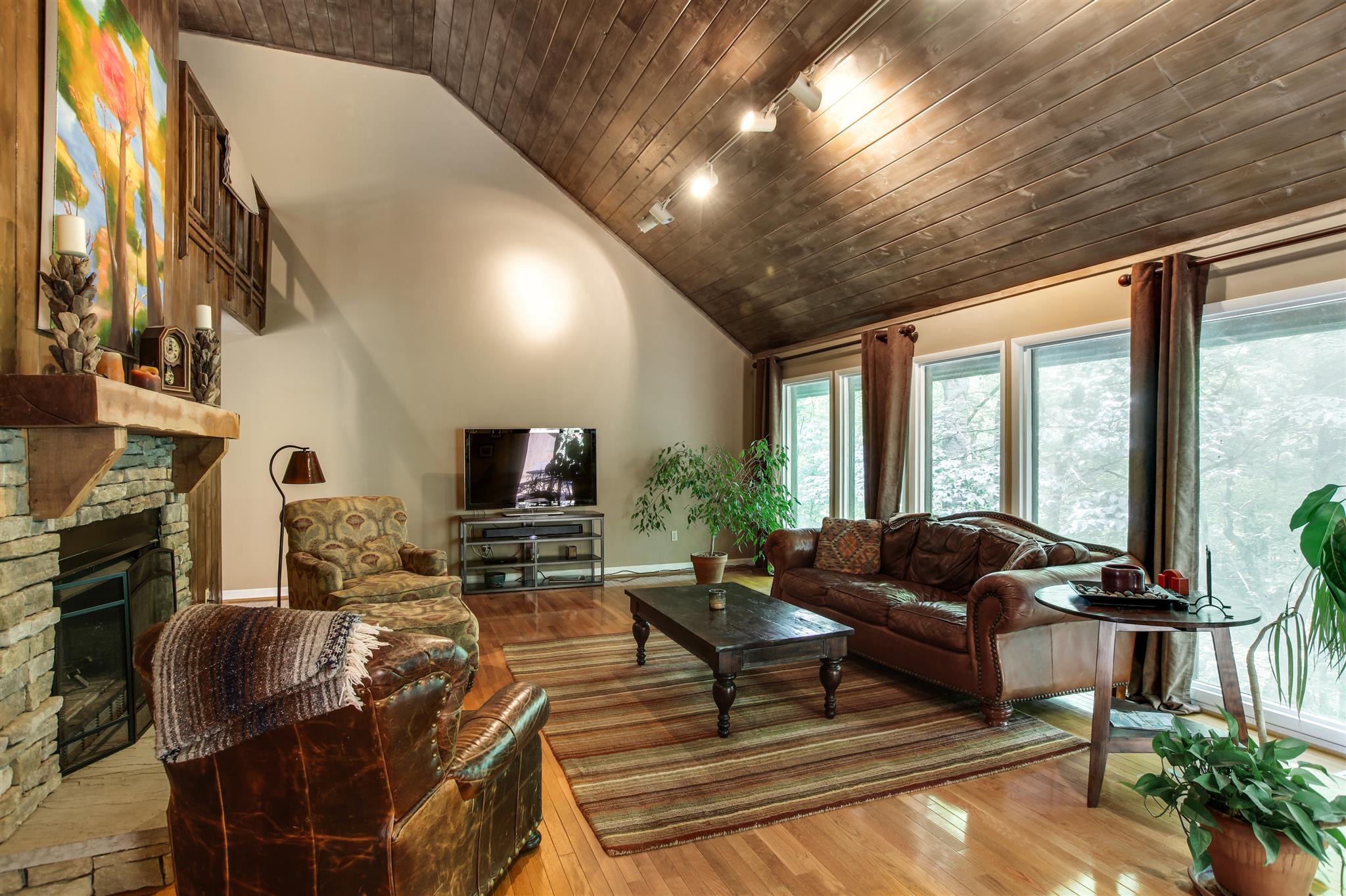 823 High Point Ridge Road Franklin, TN 37069 - Photo 6 of 30 a living room with fireplace furniture and a flat screen tv