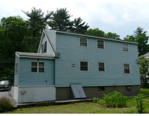 296 Salem Road Billerica, MA 01821 - Photo 11 of 11 a front view of a house with a yard
