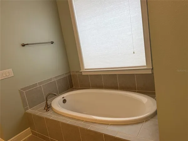 a view of a room with windows