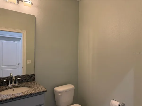 a view of a room with a large window