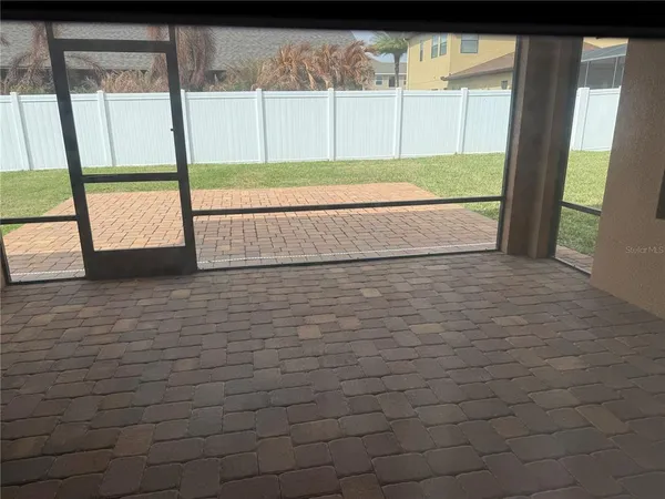 a view of a hallway with entryway