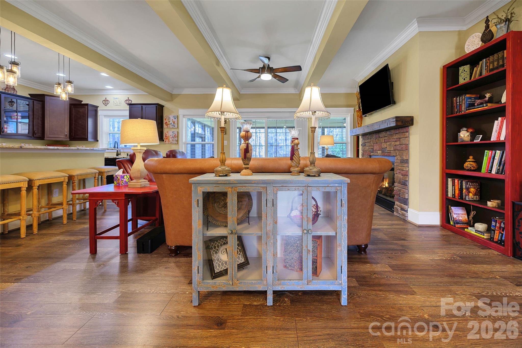 211 Holly Ridge Road Dallas, NC 28034 - Photo 14 of 46 a view of a dining room with furniture and wooden floor