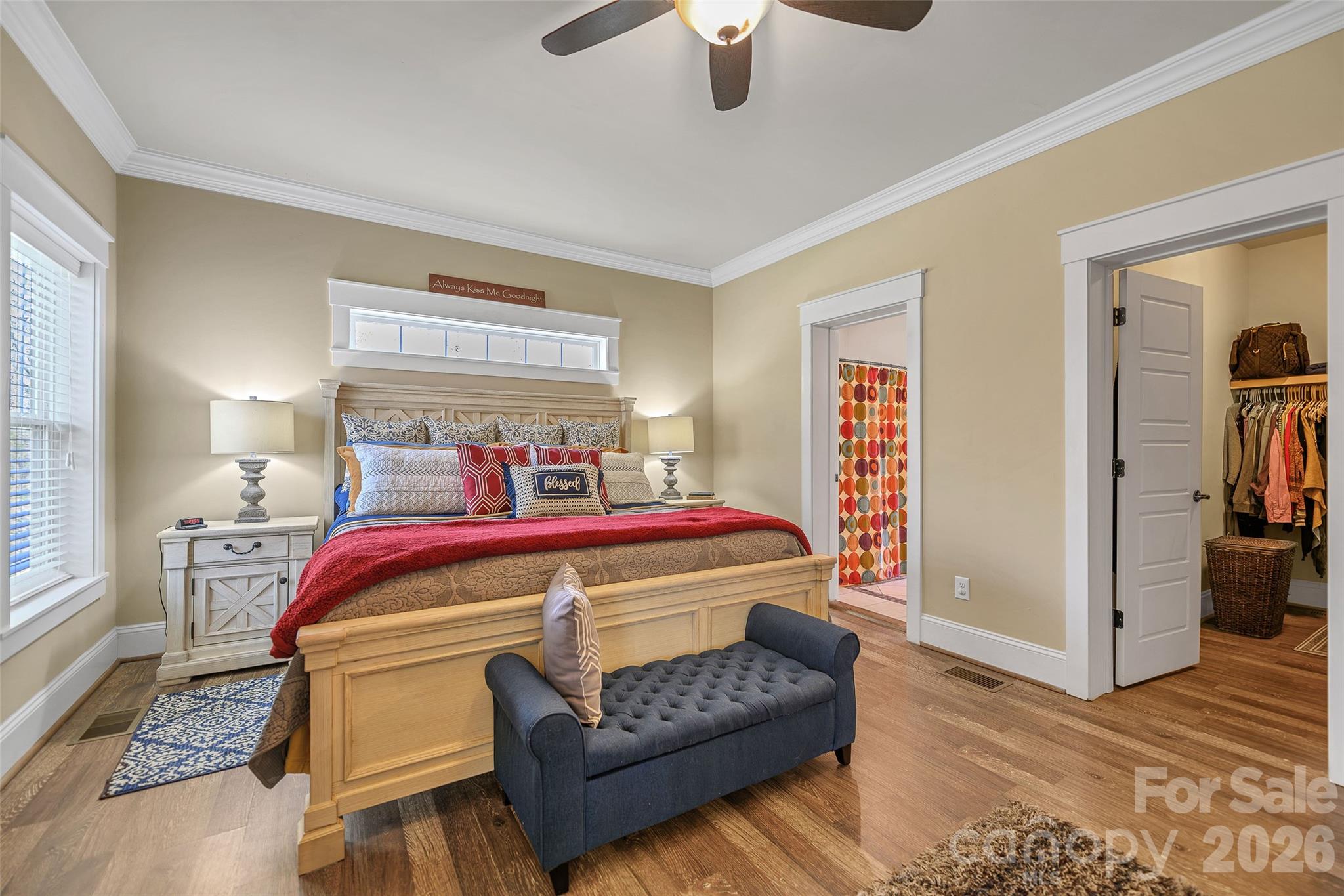 211 Holly Ridge Road Dallas, NC 28034 - Photo 23 of 46 a bedroom with a bed and wooden floor
