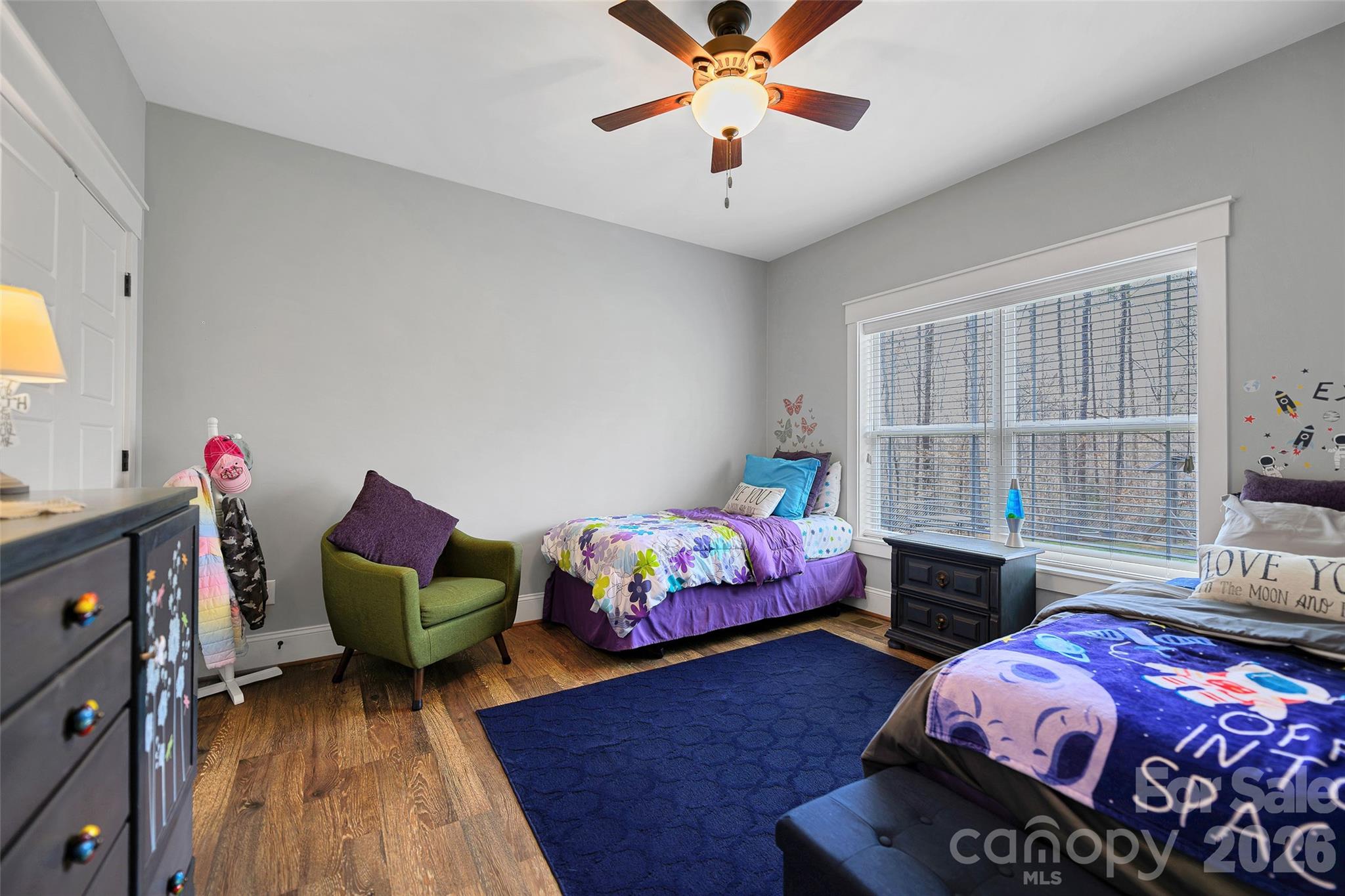 211 Holly Ridge Road Dallas, NC 28034 - Photo 28 of 46 a bedroom with furniture and a wooden floor